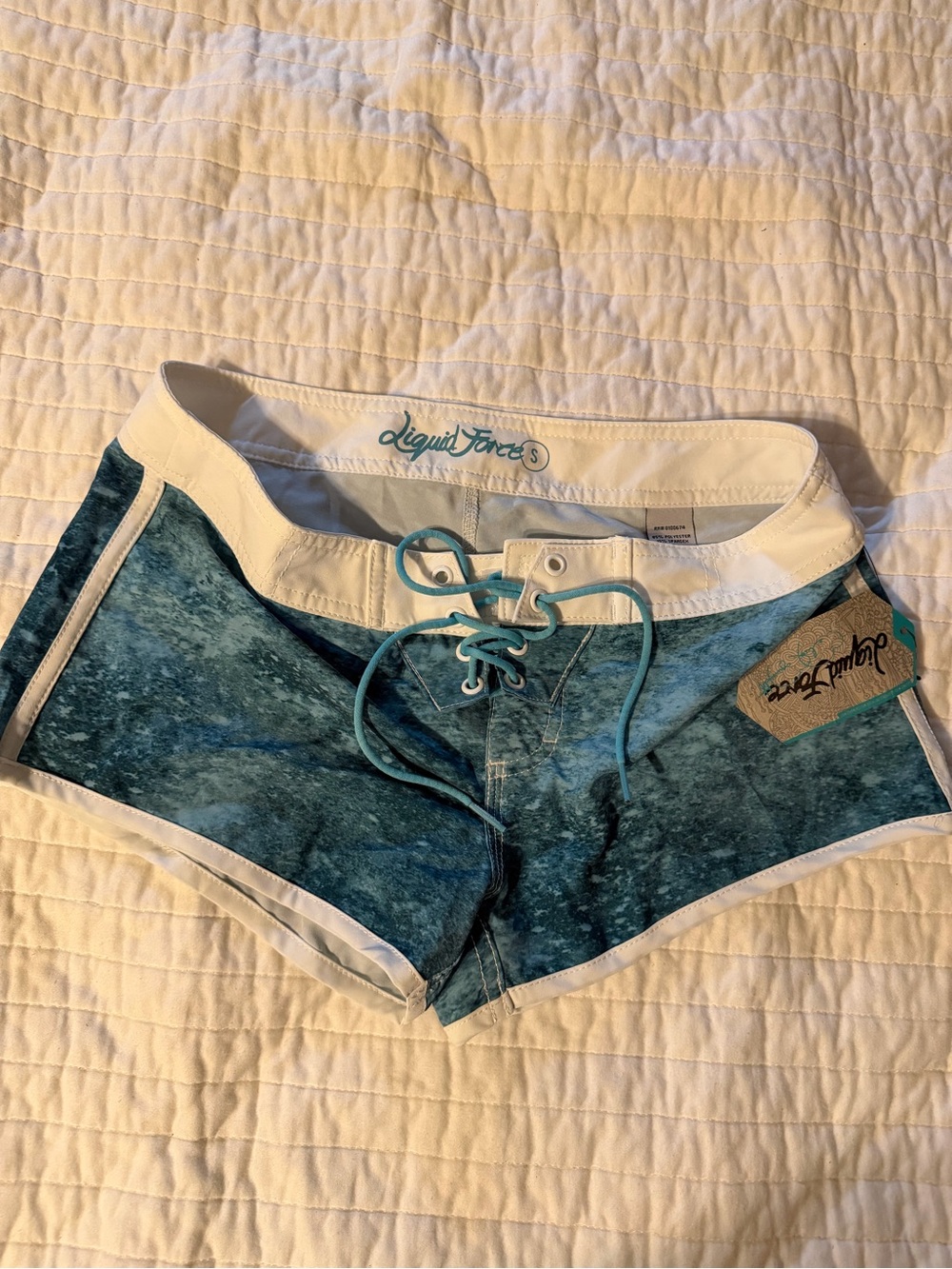 NWT Liquid Force Women's Aqua Blue Boardshorts in size Small.